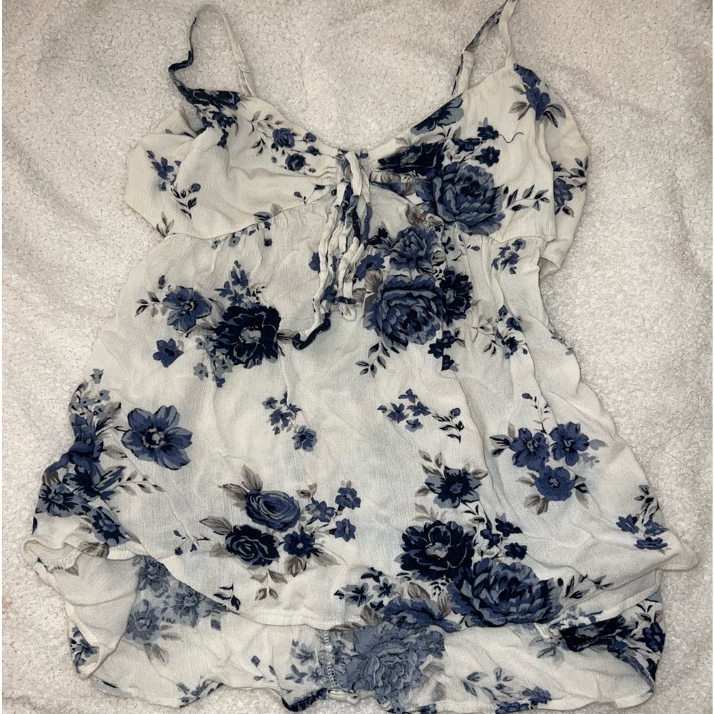 White flowy tank top with blue flowers from American Eagle Outfitters